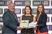3 June 2014; Gillian Dufficy, Roscommon, is presented with her Division 4 Team of the League award by Pat Quill, President, Ladies Gaelic Football Association and Lynn Moynihan, Local Marketing Manager, Tesco Ireland, during the 2014 TESCO HomeGrown Ladies National Football Team of the League Presentations. Croke Park, Dublin. Picture credit: Barry Cregg / SPORTSFILE