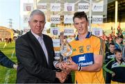 4 June 2014; Bobby Duggan, Clare, is presented with the Man of the Match award by Ger Cunningham, Bord Gais Energy Sports Ambassador. Bord Gais Energy Munster GAA Hurling Under 21 Championship Quarter-Final, Limerick v Clare, Gaelic Grounds, Limerick. Picture credit: Diarmuid Greene / SPORTSFILE