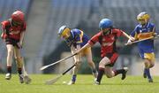 12 May 2006; Danny Balance, St. Vincents, Glasnevin, supported by team-mate John Garrahan, right, in action against David Byrne, left, and Anika Babel, Scoil Naomh Olaf, Balally. Allianz Cumann na mBunscoil Finals, Corn Ui Mhaolain Final, St. Vincents, Glasnevin v Scoil Naomh Olaf, Croke Park, Dublin. Picture credit: Brian Lawless / SPORTSFILE
