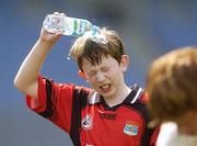 12 May 2006; Matthew Norgrove, Scoil Naomh Olaf, Balally, cools down at half-time. Allianz Cumann na mBunscoil Finals, Corn Ui Mhaolain Final, St. Vincents, Glasnevin v Scoil Naomh Olaf, Croke Park, Dublin. Picture credit: Brian Lawless / SPORTSFILE