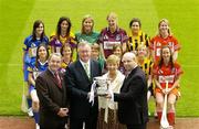 16 May 2006; Gala, Ireland's fastest growing retailer, has been announced as the first commercial sponsor of the All-Ireland Senior Camogie Championship. Pictured at the launch are, from left, Nickey Brennan, President of the GAA, Minister for Arts, Sport and Tourism, John O'Donoghue TD, Liz Howard, President, Cumann Camogaiochta na nGael, and Tom Keogh, CEO, Gala, with players from the 6 competing counties, Tipperary, Wexford, Limerick, Galway, Kilkanny and Cork. Croke Park, Dublin. Picture credit: Brendan Moran / SPORTSFILE