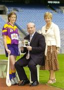 16 May 2006; Gala, Ireland's fastest growing retailer, has been announced as the first commercial sponsor of the All-Ireland Senior Camogie Championship. Pictured at the launch are, from left, Kate Kelly, Wexford, Tom Keogh, CEO Gala and Liz Howard, President Cumann Camogaiochta na nGael. Croke Park, Dublin. Picture credit; Brendan Moran / SPORTSFILE