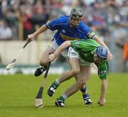14 May 2006; Stephen Lucey, Limerick, is tackled by Conor O'Mahoney, Limerick. Guinness Munster Senior Hurling Championship Quarter Final, Tipperary v Limerick, Semple Stadium, Thurles, Co. Tipperary. Picture credit; Ray McManus / SPORTSFILE