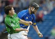14 May 2006; Philip Maher, Tipperary, is tackled by Barry Foley, Limerick. Guinness Munster Senior Hurling Championship Quarter Final, Tipperary v Limerick, Semple Stadium, Thurles, Co. Tipperary. Picture credit; Ray McManus / SPORTSFILE