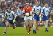 14 May 2006; Malachy Mackin, Armagh, in action against Paul Finlay, Monaghan. Bank of Ireland Ulster Senior Football Championship, Round 1, Armagh v Monaghan, St. Tighernach's Park, Clones, Co. Monaghan. Picture credit; Damien Eagers / SPORTSFILE