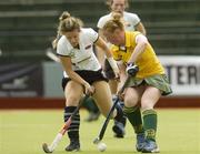 19 May 2006; Ciara O'Brien, Railway Union, holds possession from Shirine Young, Hermes. ESB Club Championship, Hermes v Railway Union, National Hockey Stadium, UCD, Belfield, Dublin. Picture credit; David Levingstone / SPORTSFILE