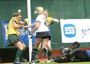 19 May 2006; Catriona Carey, Hermes, 4, shoots to score a goal despite the attention of Karen Clarke and Ciara O'Brien, Railway Union. ESB Club Championship, Hermes v Railway Union, National Hockey Stadium, UCD, Belfield, Dublin. Picture credit; David Levingstone / SPORTSFILE