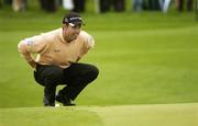 19 May 2006; Padraig Harrington lines up a putt on the 4th green during round 2. Nissan Irish Open Golf Championship, Carton House Golf Club, Maynooth, Co. Kildare. Picture credit; Pat Murphy / SPORTSFILE