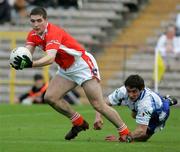 20 May 2006; Brian Mallon, Armagh, is tackled by Damien Freeman, Monaghan. Bank of Ireland Ulster Senior Football Championship Replay, Round 1, Armagh v Monaghan, St. Tighernach's Park, Clones, Co. Monaghan. Picture credit; Oliver McVeigh / SPORTSFILE