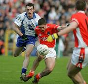 20 May 2006; Brian Mallon, Armagh, is tackled by Colm Flanagan, Monaghan. Bank of Ireland Ulster Senior Football Championship Replay, Round 1, Armagh v Monaghan, St. Tighernach's Park, Clones, Co. Monaghan. Picture credit; Oliver McVeigh / SPORTSFILE