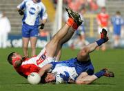 20 May 2006; Tony Mc Entee, Armagh, is tackled by Ciaran Hanratty, Monaghan. Bank of Ireland Ulster Senior Football Championship Replay, Round 1, Armagh v Monaghan, St. Tighernach's Park, Clones, Co. Monaghan. Picture credit; Oliver McVeigh / SPORTSFILE