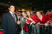 20 May 2006; Munster's Donncha O'Callaghan arrives at Shannon Airport with the Heineken Cup after the Heineken Cup Final in Cardiff. Picture credit; Kieran Clancy / SPORTSFILE