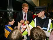 20 May 2006; Munster's Paul O'Connell signs autographs for fans at Shannon Airport after returning from Cardiff after the Heineken Cup Final. Picture credit; Kieran Clancy / SPORTSFILE