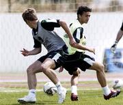 21 May 2006; Liam Lawrence, left, Republic of Ireland, in action his team-mate Stephen Kelly, during squad training. Municipal Stadium, Lagos, Portugal. Picture credit; David Maher / SPORTSFILE