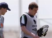 21 May 2006; Richard Dunne, Republic of Ireland, with his manager Steve Staunton during squad training. Municipal Stadium, Lagos, Portugal. Picture credit; David Maher / SPORTSFILE