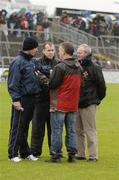 21 May 2006; Referee Pat McEnaney inspects the pitch with his standby referee Michael Ryan, right, and the two managers, Peter Forde, left, Galway and Tommy Breheny, Sligo. The match was postponed after the inspection. Bank of Ireland Connacht Senior Football Championship, Quarter-final, Galway v Sligo, Pearse Stadium, Galway. Picture credit; Ray McManus / SPORTSFILE