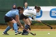 21 May 2006; Aoife Mitchell, Hermes, in action against Judith McVicker, Ballymoney. The Women's 2006 ESB Club Championships, Ballymoney v Hermes, National Hockey Stadium, UCD, Belfield, Dublin. Picture credit: Ciara Lyster / SPORTSFILE