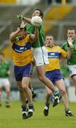 21 May 2006; John Galvin, Limerick, contests a high ball with Peter O'Dwyer, Clare. Bank of Ireland Munster Senior Football Championship, Quarter-final, Limerick v Clare, Gaelic Grounds, Limerick. Picture credit; Damien Eagers / SPORTSFILE