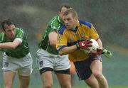 21 May 2006; Ger Quinlan, Clare, in action against Jason Stokes, Limerick. Bank of Ireland Munster Senior Football Championship, Quarter-final, Limerick v Clare, Gaelic Grounds, Limerick. Picture credit; Damien Eagers / SPORTSFILE