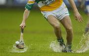 21 May 2006; Offaly's Kevin Brady gains possession on a waterlogged pitch in O'Moore Park. Guinness Leinster Senior Hurling Championship, Quarter-final, Laois v Offaly, O'Moore Park, Portlaoise, Co. Laois. Picture credit; Brendan Moran / SPORTSFILE
