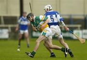 21 May 2006; Brendan Murphy, Offaly, in action against Joe Fitzpatrick, Laois. Guinness Leinster Senior Hurling Championship, Quarter-final, Laois v Offaly, O'Moore Park, Portlaoise, Co. Laois. Picture credit; Brendan Moran / SPORTSFILE