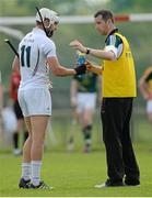31 May 2014; Kildare selector Tom O'Meara in conversation with Paul Divilly. Christy Ring Cup Semi-Final, Kildare v Meath, St Loman's Park, Trim, Co. Meath. Picture credit: Piaras Ó Mídheach / SPORTSFILE