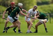 31 May 2014; Gerry Keegan, Kildare, in action against Meath players from left Stephen Clynch, Johnny Meyler and Shane Whitty. Christy Ring Cup Semi-Final, Kildare v Meath, St Loman's Park, Trim, Co. Meath. Picture credit: Piaras Ó Mídheach / SPORTSFILE