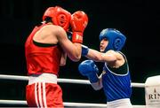 6 June 2014; Katie Taylor, Ireland, exchanges punches with Denitsa Eliseeva, Bulgaria, left, during their 60kg Semi-Final bout. 2014 European Women’s Boxing Championships Semi-Finals, Polivalenta Hall, Bucharest, Romania. Picture credit: Pat Murphy / SPORTSFILE