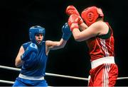 6 June 2014; Maria Kovacs, Hungary, exchanges punches with Emine Bozduman, Turkey, in their 81+kg Semi-Final bout. 2014 European Women’s Boxing Championships Semi-Finals, Polivalenta Hall, Bucharest, Romania. Picture credit: Pat Murphy / SPORTSFILE