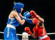 6 June 2014; Natasha Jonas, England, exchanges punches with Simona Sitar, Romania, left, in their 64kg Semi-Final bout. 2014 European Women’s Boxing Championships Semi-Finals, Polivalenta Hall, Bucharest, Romania. Picture credit: Pat Murphy / SPORTSFILE