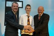 20 May 2006; Paul Dick, St. Malachy's Belfast, who was presented with the Male U16 player of the Year award by Tony Colgan, President of Basketball Ireland, right, and Eddie Gilmartin, left. Basketball Ireland Awards, Conrad Hotel, Dublin. Picture credit; Pat Murphy / SPORTSFILE