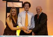 20 May 2006; Ciaran White, Shamrock Rovers, Dublin, who was presented with the Male U20 player of the year award by Tony Colgan, President of Basketball Ireland, right, and Anne Hennessy. Basketball Ireland Awards, Conrad Hotel, Dublin. Picture credit; Pat Murphy / SPORTSFILE