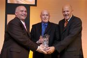 20 May 2006; Martin McGettrick who was presented with the Men's Senior Coach of the Year award by Tony Colgan, President of Basketball Ireland, right, and Sean O'Reilly, left. Basketball Ireland Awards, Conrad Hotel, Dublin. Picture credit; Pat Murphy / SPORTSFILE