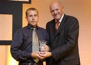 20 May 2006; Declan Wall who was presented with the Male Senior Player of the Year award by Tony Colgan, President of Basketball Ireland, right. Basketball Ireland Awards, Conrad Hotel, Dublin. Picture credit; Pat Murphy / SPORTSFILE