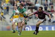 14 May 2006; Ciaran McManus, Offaly, is tackled by Damien Healy, Westmeath. Bank of Ireland Leinster Senior Football Championship, Round 1, Westmeath v Offaly, Croke Park, Dublin. Picture credit; Brian Lawless / SPORTSFILE