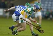 21 May 2006; David Franks, Offaly, in action against Sean Lowry, Laois. Guinness Leinster Senior Hurling Championship, Quarter-final, Laois v Offaly, O'Moore Park, Portlaoise, Co. Laois. Picture credit; Brendan Moran / SPORTSFILE