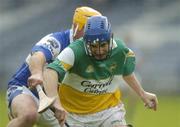 21 May 2006; David Franks, Offaly, in action against David Cuddy, Laois. Guinness Leinster Senior Hurling Championship, Quarter-final, Laois v Offaly, O'Moore Park, Portlaoise, Co. Laois. Picture credit; Brendan Moran / SPORTSFILE