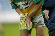 21 May 2006; Ger Oakley, Offaly, dries his hands with a towel during the game. Guinness Leinster Senior Hurling Championship, Quarter-final, Laois v Offaly, O'Moore Park, Portlaoise, Co. Laois. Picture credit; Brendan Moran / SPORTSFILE