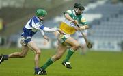 21 May 2006; Gary Hanniffy, Offaly, in action against James Hyland, Laois. Guinness Leinster Senior Hurling Championship, Quarter-final, Laois v Offaly, O'Moore Park, Portlaoise, Co. Laois. Picture credit; Brendan Moran / SPORTSFILE