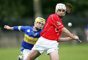 23 May 2006; Eoin Gleeson, Cork, in action against John O'Callaghan, Tipperary. All-Ireland Vocational Schools Hurling Final Replay, Tipperary v Cork, Cashel, Co. Tipperary. Picture credit; John Kelly / SPORTSFILE