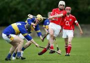 23 May 2006; John O'callaghan, Cork, in action against Tipperary players Darren O'Connor and Eoin Gleeson. All-Ireland Vocational Schools Hurling Final Replay, Tipperary v Cork, Cashel, Co. Tipperary. Picture credit; John Kelly / SPORTSFILE