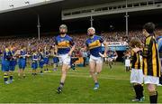 4 May 2014; Tipperary's Cathal Barrett, left, and Padraic Maher make their way out for the start of the game. Allianz Hurling League Division 1 Final, Tipperary v Kilkenny, Semple Stadium, Thurles, Co. Tipperary. Picture credit: Diarmuid Greene / SPORTSFILE