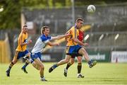 7 June 2014; Shane McGrath, Clare, in action against Conor Phelan, Waterford. Munster GAA Football Senior Championship, Quarter-Final, Clare v Waterford, Cusack Park, Ennis, Co. Clare. Picture credit: Barry Cregg / SPORTSFILE