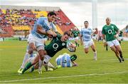 7 June 2014; Jonathan Sexton, Ireland, goes over for his side's second try despite the tackle of Manuel Montero, Argentina. Summer Tour 2014, First Test, Argentina v Ireland. Estadio Centenario, Resistencia, Chaco, Argentina. Picture credit: Stephen McCarthy / SPORTSFILE