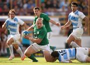 7 June 2014; Luke Marshall, Ireland, is tackled by Joaquin Tuculet, Argentina. Summer Tour 2014, First Test, Argentina v Ireland. Estadio Centenario, Resistencia, Chaco, Argentina. Picture credit: Stephen McCarthy / SPORTSFILE