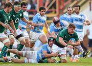 7 June 2014; Jordi Murphy, Ireland, is tackled by Benjamin Macome, left, and Tomas Lavanini, Argentina. Summer Tour 2014, First Test, Argentina v Ireland. Estadio Centenario, Resistencia, Chaco, Argentina. Picture credit: Stephen McCarthy / SPORTSFILE
