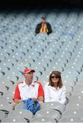 8 June 2014; Louth supporters, and a Kilkenny fan, sit in the stands ahead of the game. Leinster GAA Football Senior Championship, Quarter-Final, Louth v Kildare, Croke Park, Dublin.  Picture credit: Brendan Moran / SPORTSFILE