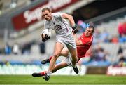 8 June 2014; Tommy Moolick, Kildare, pushes off the tackle from Dessie Finnegan, Louth. Leinster GAA Football Senior Championship, Quarter-Final, Louth v Kildare, Croke Park, Dublin.  Picture credit: Brendan Moran / SPORTSFILE