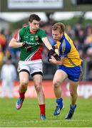 8 June 2014; Niall Daly, Roscommon, in action against Alan Freeman, Mayo. Connacht GAA Football Senior Championship, Semi-Final, Roscommon v Mayo, Dr. Hyde Park, Roscommon. Picture credit: Barry Cregg / SPORTSFILE