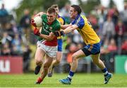 8 June 2014; Conor O'Shea, Mayo, in action against Kevin Higgins, Roscommon. Connacht GAA Football Senior Championship, Semi-Final, Roscommon v Mayo, Dr. Hyde Park, Roscommon. Picture credit: Matt Browne / SPORTSFILE